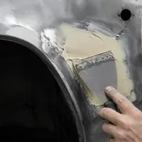 Применение антикоррозионной шпаклевки при ремонте кузова автомобиля