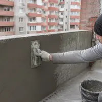 Выравнивание ограждения балкона атмосферостойкой шпаклевкой