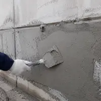 Шпаклевание бетонного фасада атмосферостойкой шпаклевкой