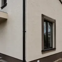 Фасад здания после утепления по системе мокрый фасад